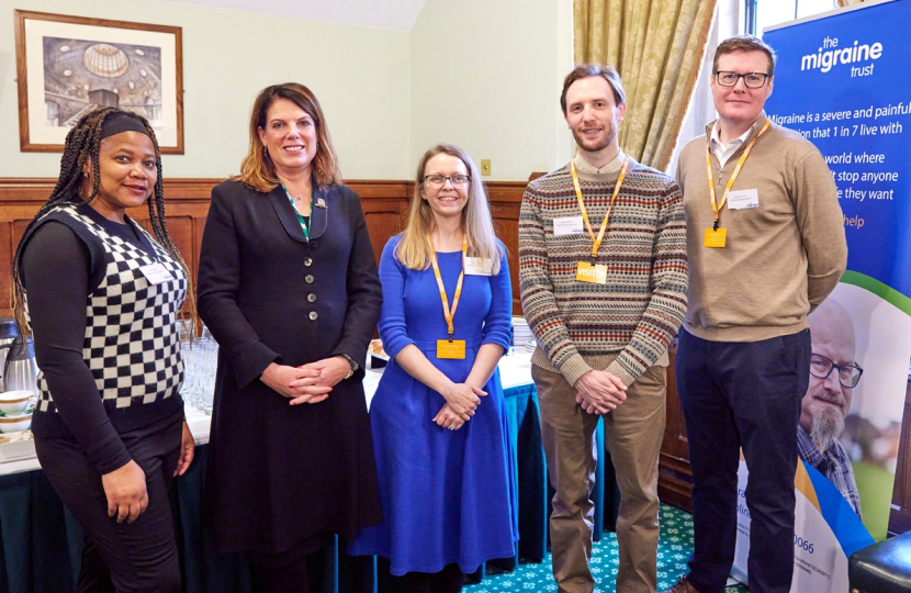 Caroline with representatives from the Migraine Trust