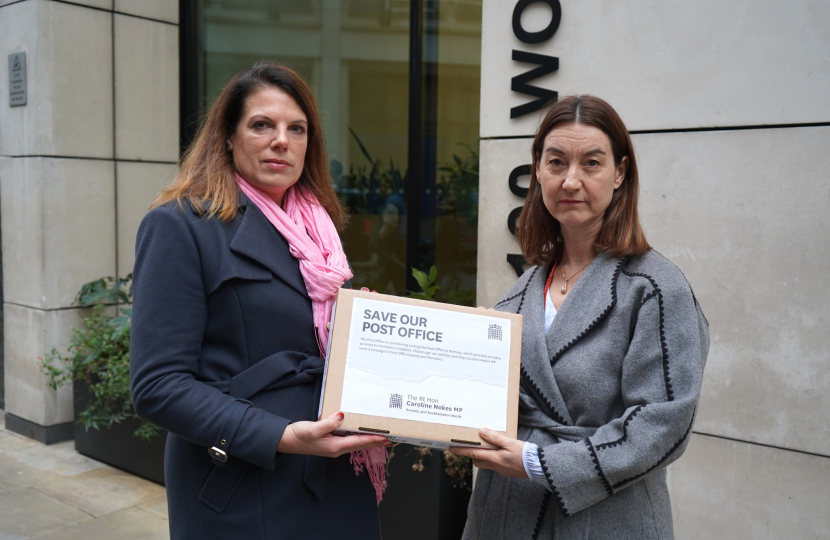 Caroline with a representative of Post Office outside their headquarters in London